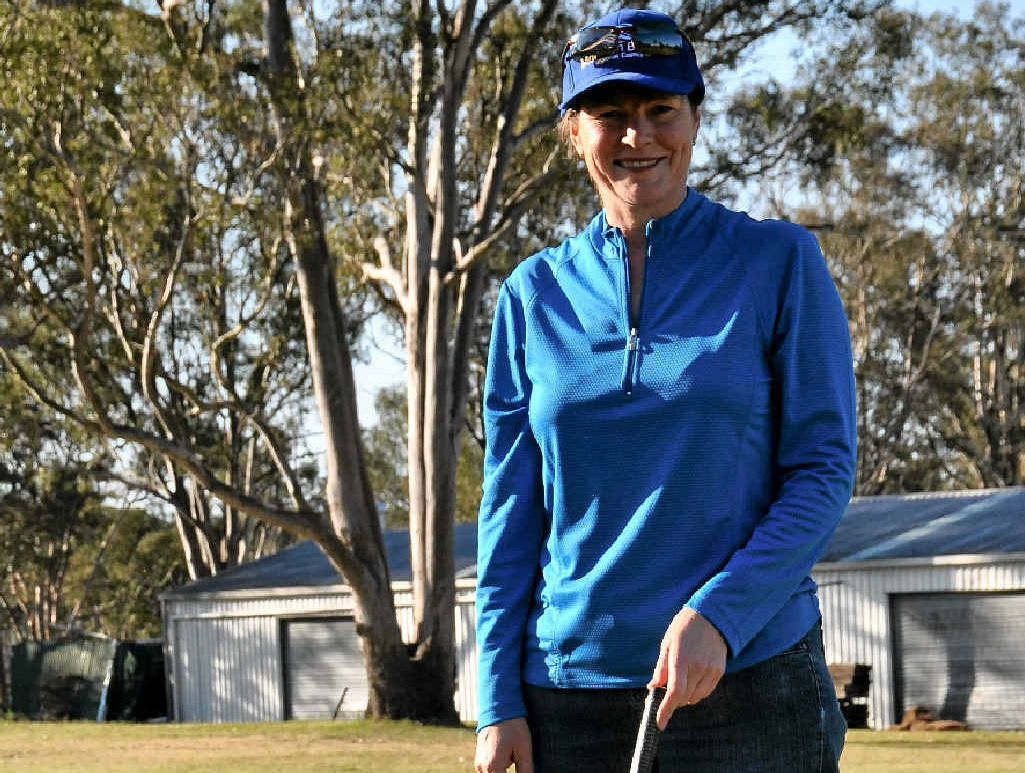 IN THE SWING OF IT: Joely Singleton enjoys the Big W DC Charity Golf Day.